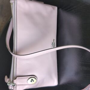 Coach Crossbody East-West Pink Leather Double Zip Crossbody.Used Great Condi